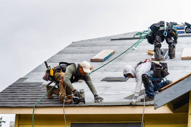 Professional Roofing technician working in Fullerton, CA